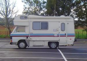 A camper built on a light truck chassis; a Class C motorhome in North American terminology.