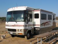 A Class A motorhome with slide-out extended